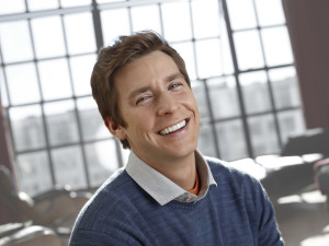 Young man smiling wearing invisalign